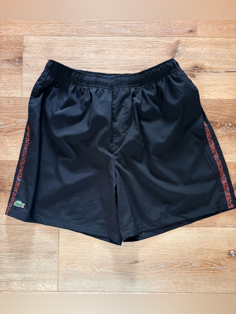 Lacoste Men’s Black Swim Shorts with Red Side Detail - size Lg/XL